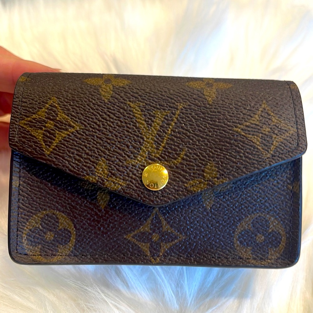 Authentic belt bag, credit cards, lipstick case.